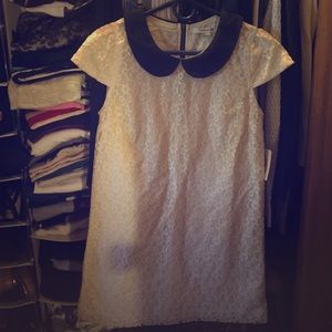 White laced dress with black trim