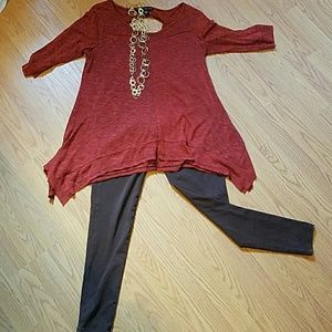 Mid length rust tunic top.  Perfect for the fall