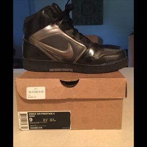 Black name brand Nike sneakers.