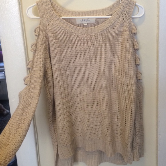 Bone colored sweater with slit arm cut outs