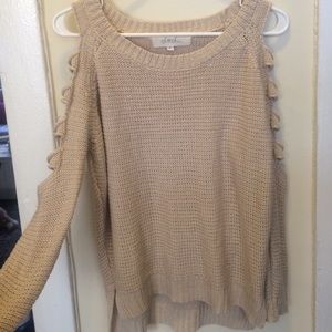 Bone colored sweater with slit arm cut outs