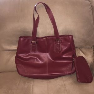 Burgundy tote bag with small cosmetic bag. Burgundy tote bag with small cosmetic bag.