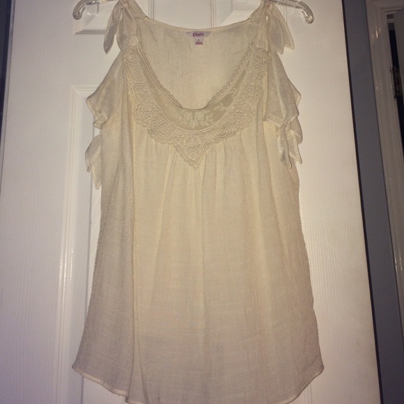 Cream blouse with embroidered neckline