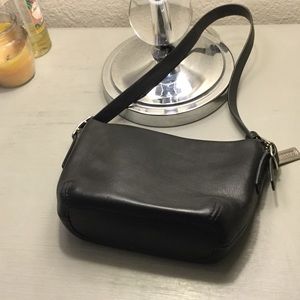 Tiny coach purse