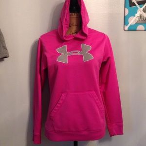 Pink under armour pull over with pocket in front.