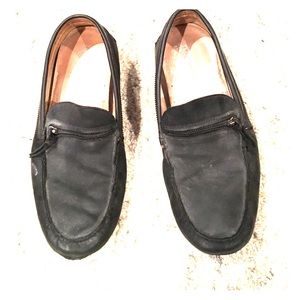 Black loafers with zipper detail