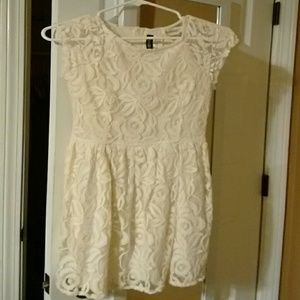 Divided white mini dress