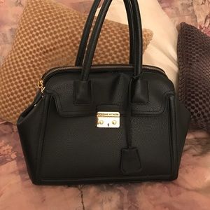 Beautiful black leather Adrienne Vittadini bag.