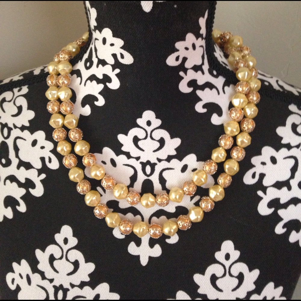 Vintage necklace interesting back hidden closure.