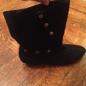 Black suede boots with silver studs