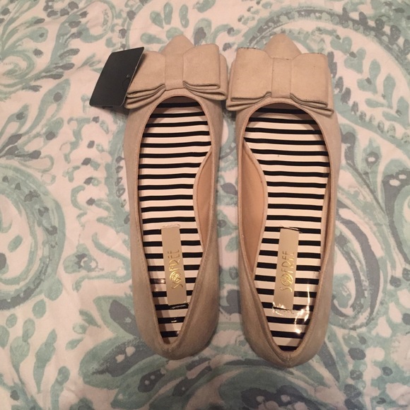 Tan suede flats with bow