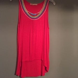 Sleeveless red tank with embroidered scoop neck