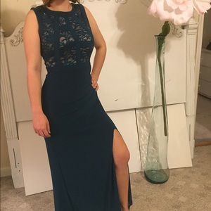 Long emerald green slit dress with lace top