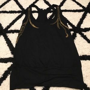 Cute black tank with gold beads.