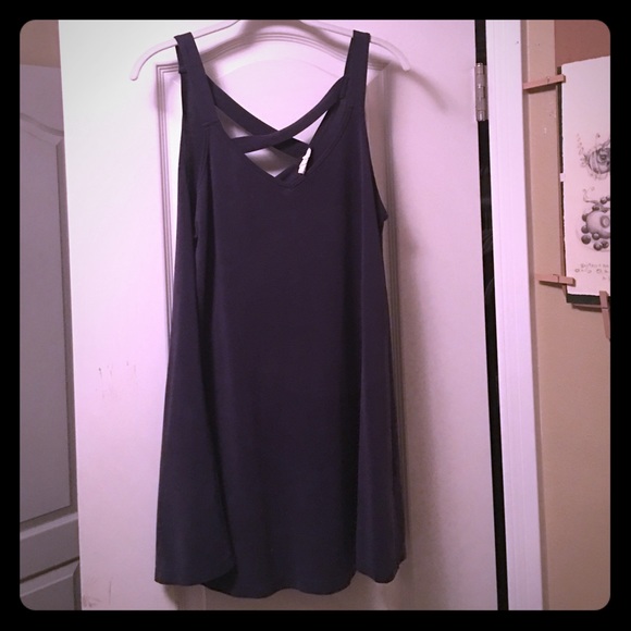 Blue sundress. Cross crossed back.