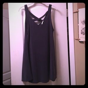 Blue sundress. Cross crossed back.