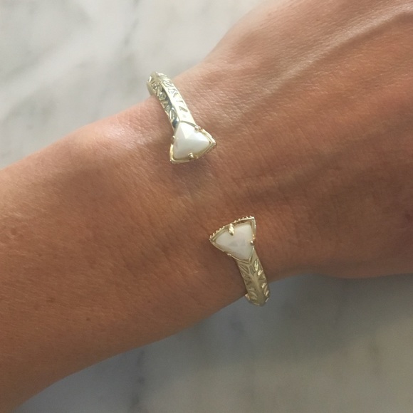 Kendra Scott bangle with white iridescent stones