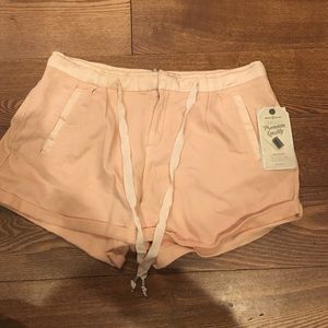 Peach sweatpant material shorts