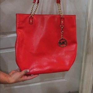 MK orange red purse