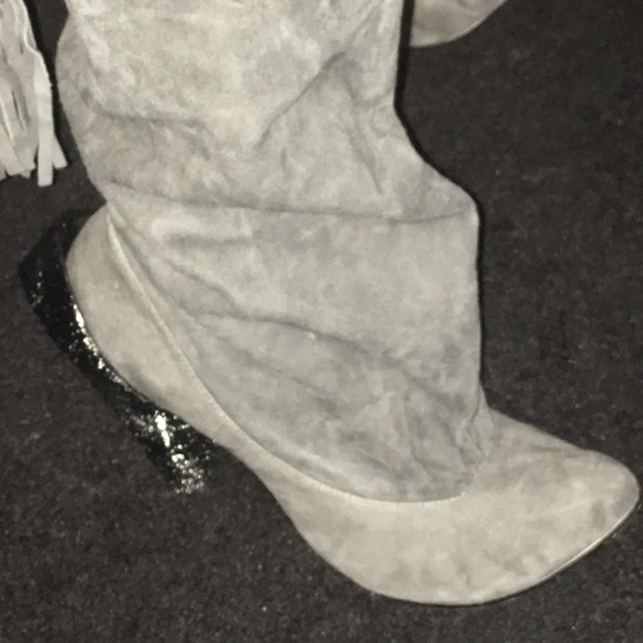 Soft suede slouch boot with tassel in the back