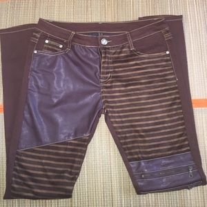 Brown suede pants with leather detail and accent