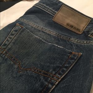 Distressed denim Diesel jeans. Size 33.