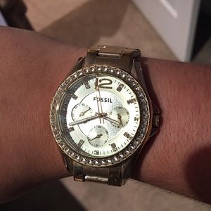 Gold fossil watch