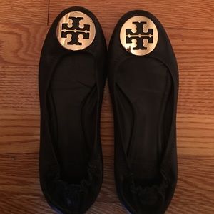 Black and gold Tory Burch flats