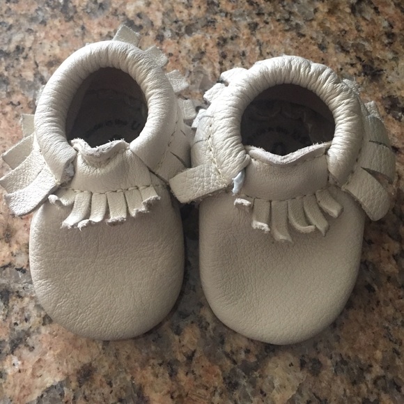 Cream newborn freshly picked moccasins
