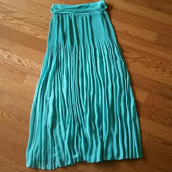 Green pleated maxi skirt