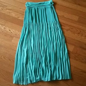 Green pleated maxi skirt