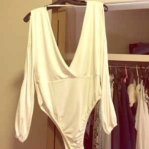 Never worn white bodysuit low cut sexy