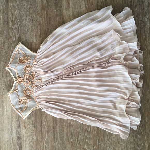 Blush pink baby doll style dress.