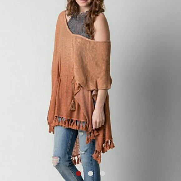 Gimmicks orange poncho