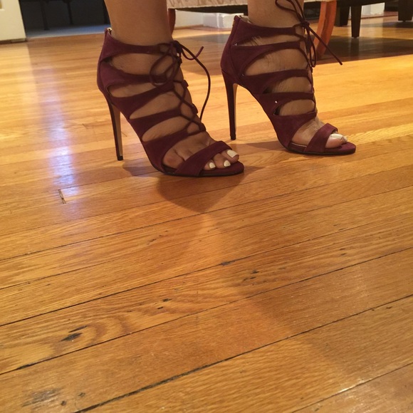 Never Worn. Wine colored suede pump w back zipper