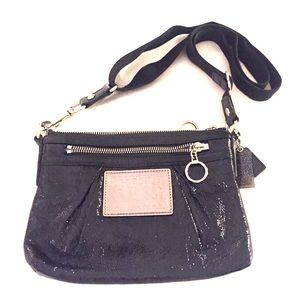 Cross body Coach purse.