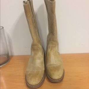 Frye boots.  Tan distressed cowboy boots