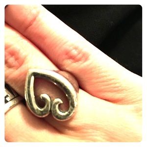 James Avery a mothers love ring.
