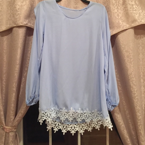 Gorgeous blue sheer blouse with floral trim