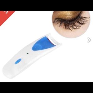 Heated eyelash curler