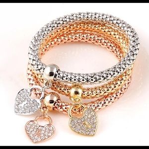Tri colored bracelet with hearts