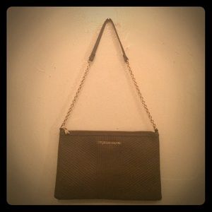 Christians Soriano quilted purse.