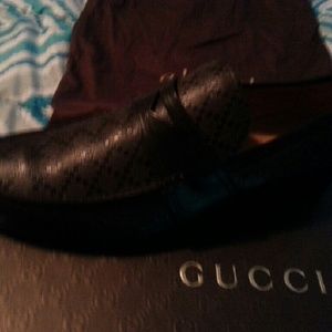 Brown Gucci loafers