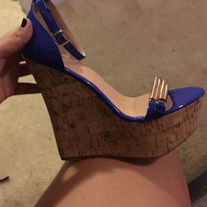 Brand new blue with gold open toe wedges.