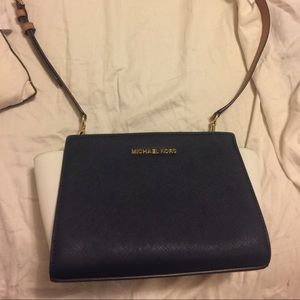 MK cross body Selma purse.