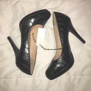 Cute simple black heels, never worn