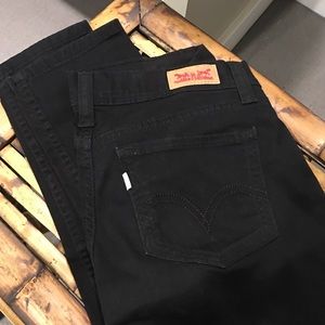 Black 524 Levi's. Skinny leg.