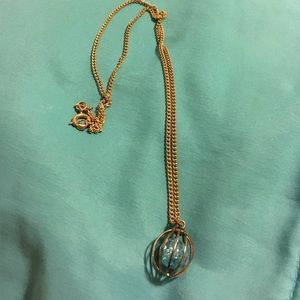 Caged blue bead necklace