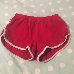 Red shorts with a white trim