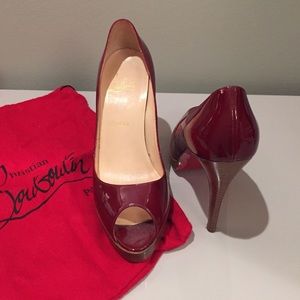 Christian Louboutin burgundy patent pumps